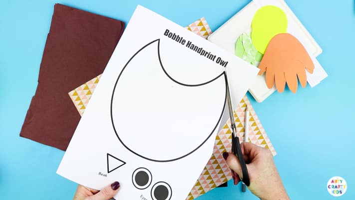 Print and cut out the Bobble Handprint Owl Printable Template.