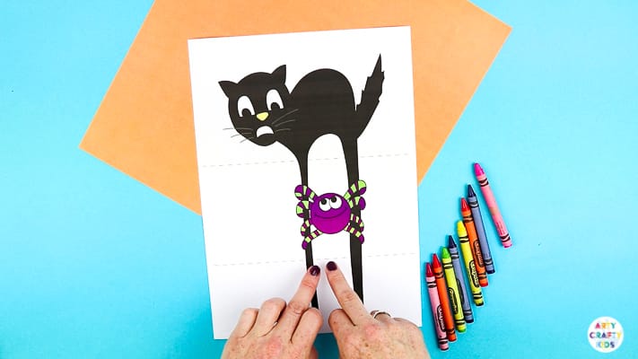 Arty Crafty Kids | Surprise Black Cat Printable Craft  - A fun Halloween craft for kids. Unfold the paper toy to reveal and an eight legged surprise!