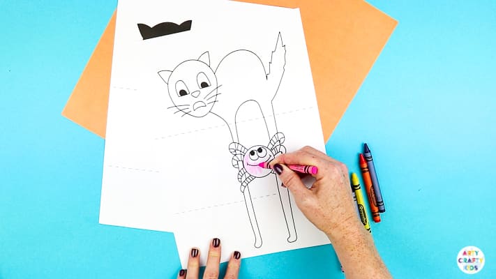 Arty Crafty Kids | Surprise Black Cat Printable Craft  - A fun Halloween craft for kids. Unfold the paper toy to reveal and an eight legged surprise!