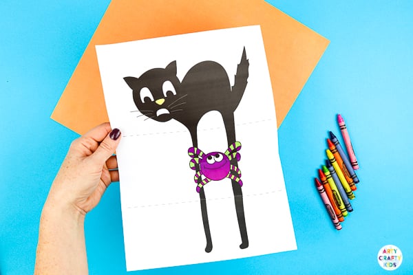 Arty Crafty Kids | Surprise Black Cat Printable Craft  - A fun Halloween craft for kids. Unfold the paper toy to reveal and an eight legged surprise!