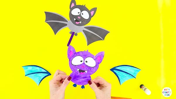 Halloween Crafts for Kids | Assemble the body of the bat paper toy.