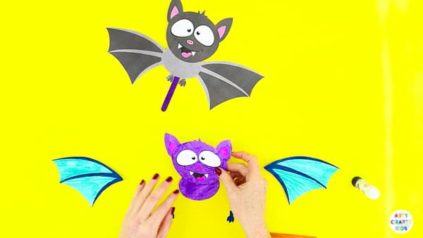 Halloween Crafts for Kids | Assemble the body of the bat paper toy.