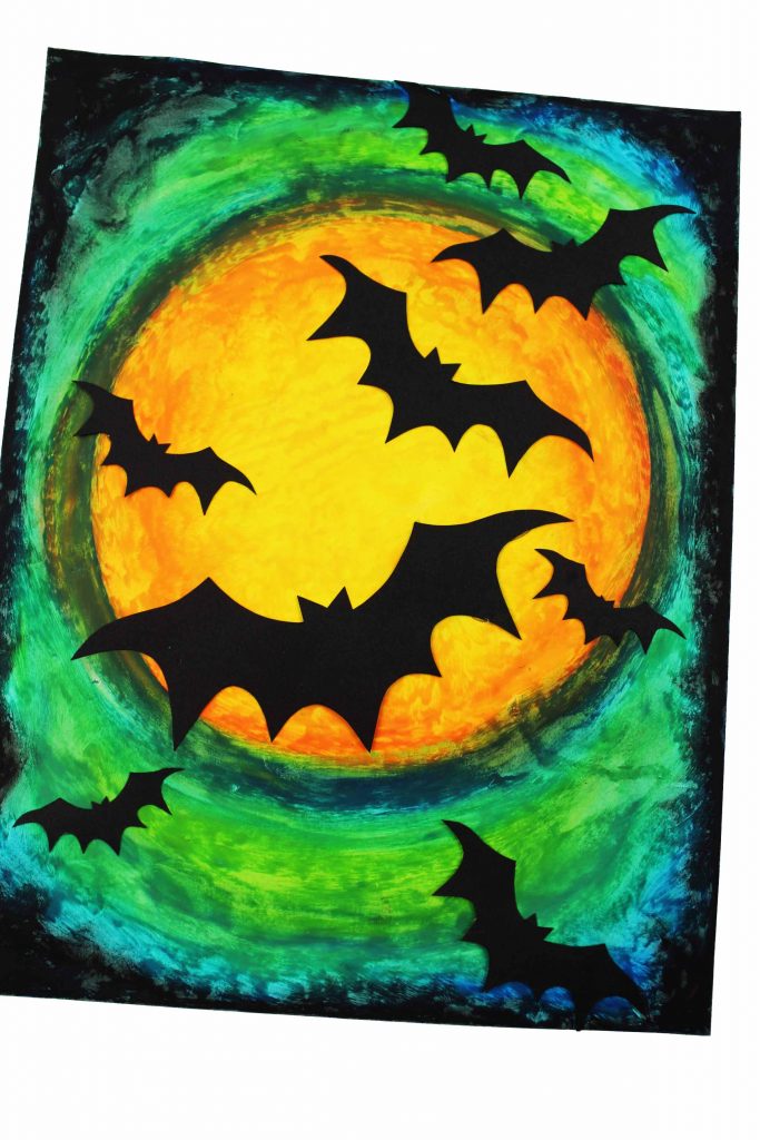 Arty Crafty Kids | Oil Pastel Bat Silhouette Art for Kids - an easy Halloween art project for kids.