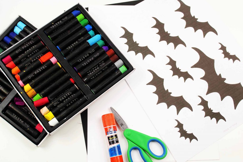 Arty Crafty Kids | Oil Pastel Bat Silhouette Art for Kids - an easy Halloween art project for kids.