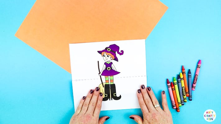 Arty Crafty Kids | Surprise Witch Printable Craft for Halloween. A fun and easy paper toy for kids. Extend the paper the reveal with the witch's best friend.