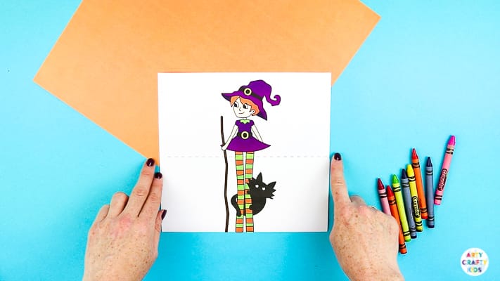 Arty Crafty Kids | Surprise Witch Printable Craft for Halloween. A fun and easy paper toy for kids. Extend the paper the reveal with the witch's best friend.