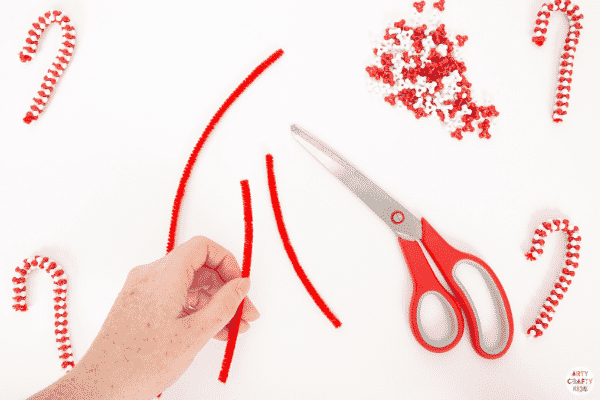 Make Beaded Candy Cane Ornaments with the kids this Christmas. Made with just two materials, kids will love this  simple and fun Christmas craft.