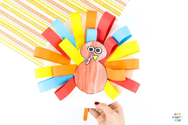 Arty Crafty Kids | Paper Plate Turkey Craft. A fun and interactive fall and Thanksgiving craft for kids.