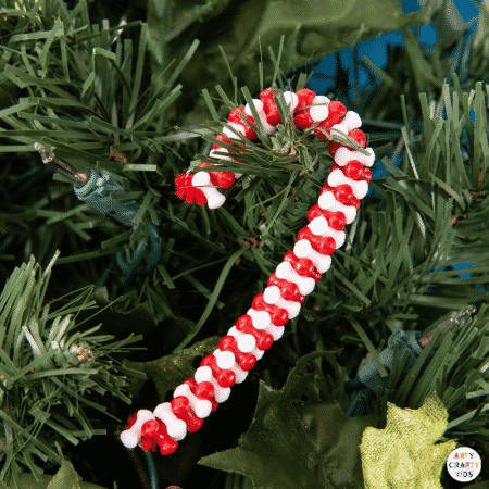 Make Beaded Candy Cane Ornaments with the kids this Christmas. Made with just two materials, kids will love this simple and fun Christmas craft.