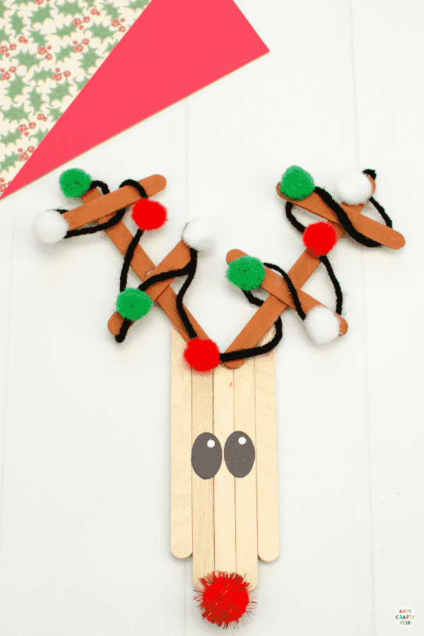 Learn how to make a Craft Stick Reindeer Ornament for the Christmas Craft | A fun and easy reindeer Christmas craft for kids.