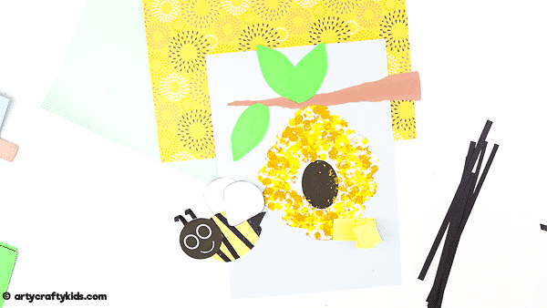 Bobble Bee Paper Craft for Kids | An engaging, fun and easy Spring Craft that kids will love! Use our printable templates to create a bee that buzzes and bounces around its beehive.