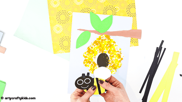 Bobble Bee Paper Craft for Kids | An engaging, fun and easy Spring Craft that kids will love! Use our printable templates to create a bee that buzzes and bounces around its beehive.