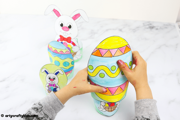 Printable Easter Paper Toy for kids to color and assemble. A combined activity of craft and play; children can use the toys within an Easter egg hunt, maths games and Easter imaginative play.