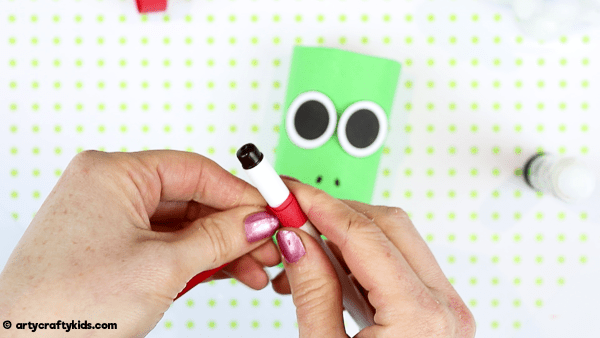 How to Make a Paper Roll Frog  - A fun and super easy spring craft for kids.