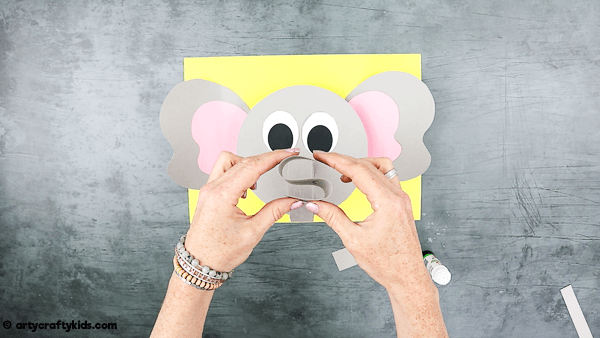 3D Paper Elephant Craft: Fold the nose into an S shape.