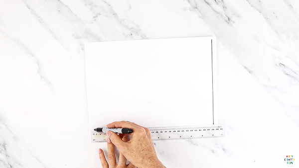 DIY Stamp Art for Kids: Measure out the a4 paper to create a grid.