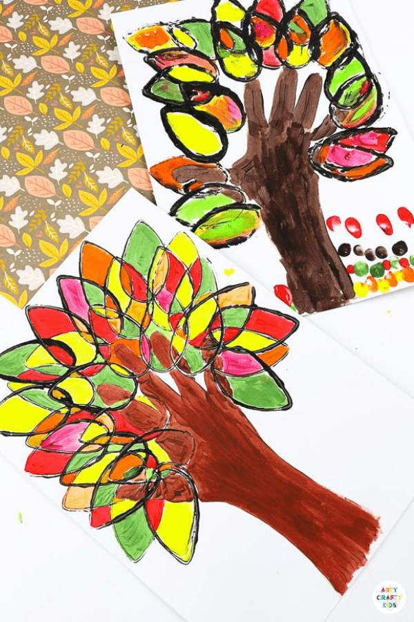 Paper Roll Printed Fall Handprint Tree - A fun and easy Autumn art project for kids that explores color and shape while adding the personal touch of a handprint.