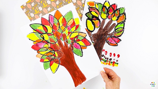 Paper Roll Printed Autumn Handprint Tree - A fun and easy Autumn art project for kids that explores color and shape while adding the personal touch of a handprint.