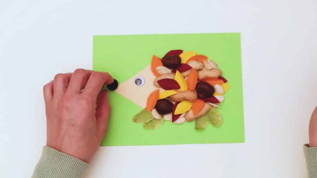 Complete the Nature Hedgehog Craft with an eye and pom-pom nose. 