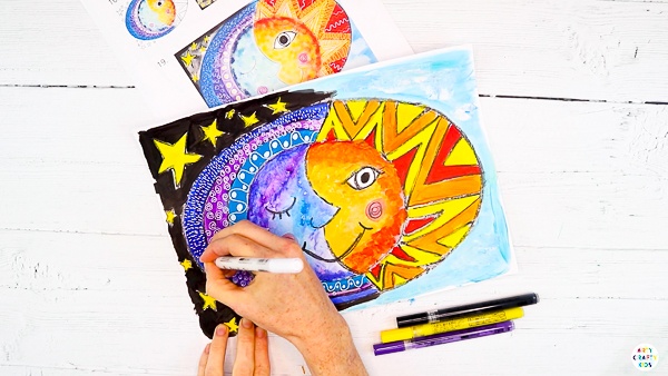 Leave the sun and moon art to draw. Once dry, add detail by doodling on top of the paint.