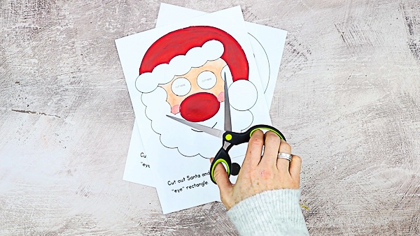 Moving Santa Craft for Kids: This easy Christmas craft is easy enough to be enjoyed independently, with only simple cutting and painting, and the interactive element brings an extra dimension of play, meaning it's ideal for pre-schoolers and school early years.
