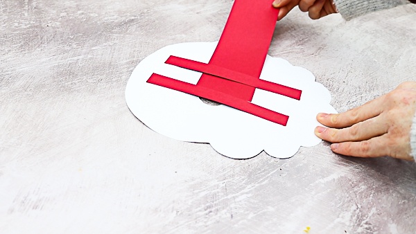 Moving Santa Craft for Kids: This easy Christmas craft is easy enough to be enjoyed independently, with only simple cutting and painting, and the interactive element brings an extra dimension of play, meaning it's ideal for pre-schoolers and school early years.