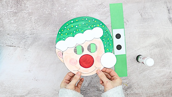 Picture showing elf with empty eyes and green backing strips.