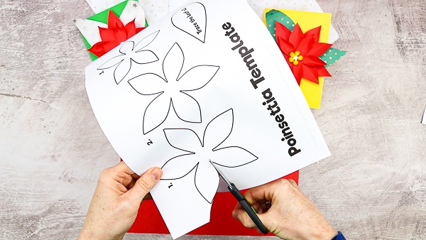 Easy Poinsettia Christmas Card: Simple, but really fun and engaging, kids will love building up the flowers and seeing them pop from the page. 

Our poinsettia template makes the craft super easy - perfect for recreating at home or within the classroom.