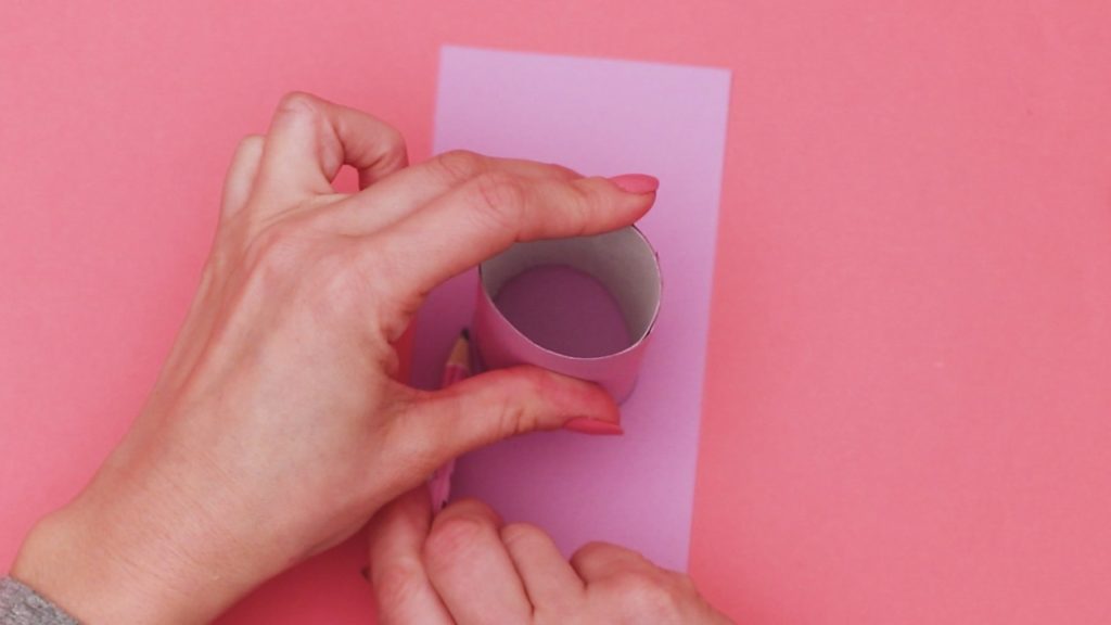 Create a paper bottom for the paper roll.