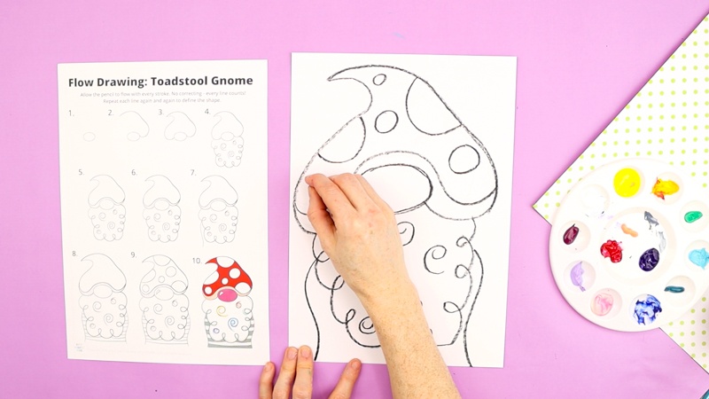 The gnome drawing tutorial is completed with spots added to the hat, to accentuate the image of a toadstool.