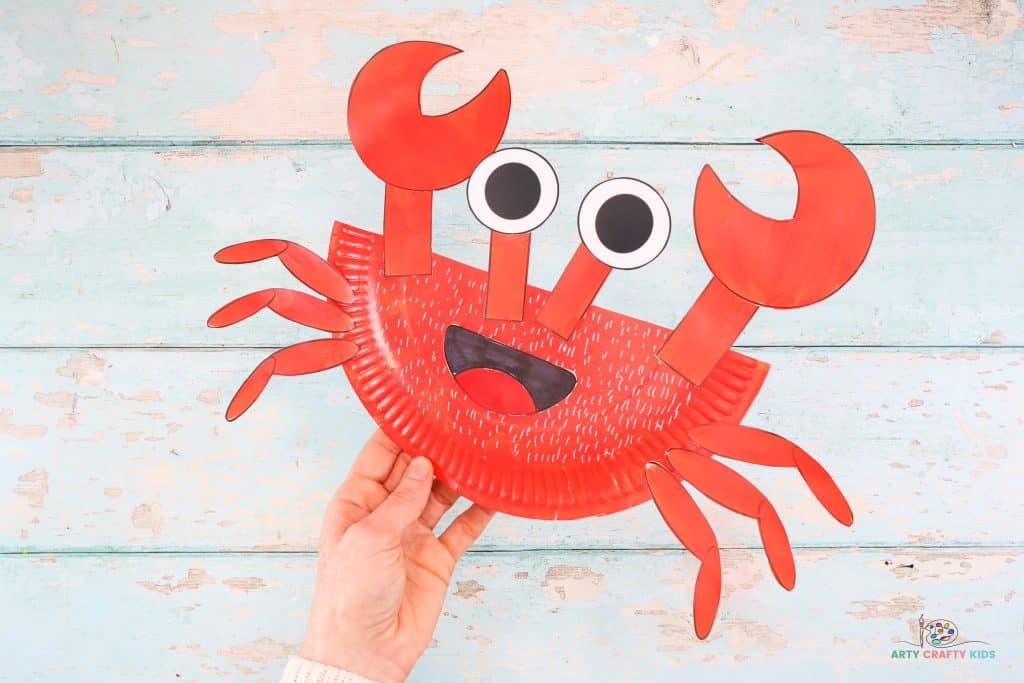 Learn how to make this Paper Plate Crab Craft with our easy to follow step-by-step tutorial. Crabs are the perfect subject for a Summer craft session with the kids and this super easy crab craft will delight Arty Crafty Kids with its easy to color and cut shapes.