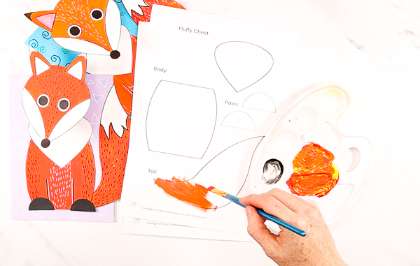 Image showing the beginnings of the fox craft with a fox template painted orange.