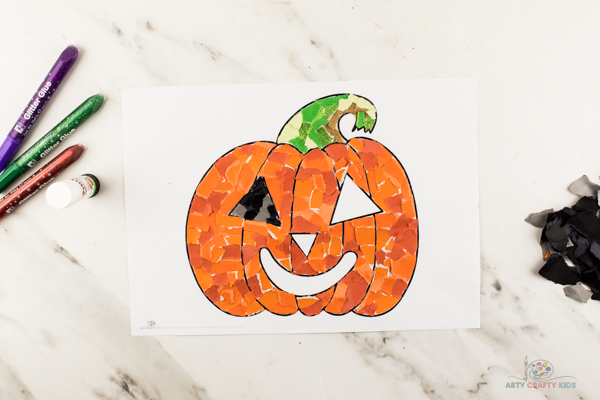 Image showing the pumpkin template nearly full with bright colored card.