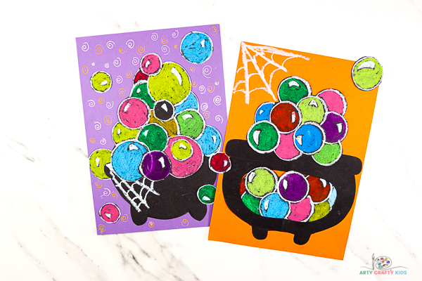 "Double, double toil and trouble; fire burn and the cauldron bubble" - Have lots of hocus pocus arty crafty fun with our Witch Cauldron Art for Halloween. Perfect for kids of all ages, children will love playing with shape and color to create their magical and extremely colorful Halloween art!