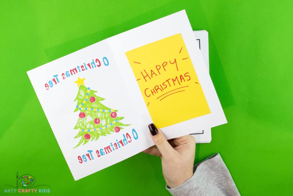 Image showing the inside of the card with a message saying "Happy Christmas".