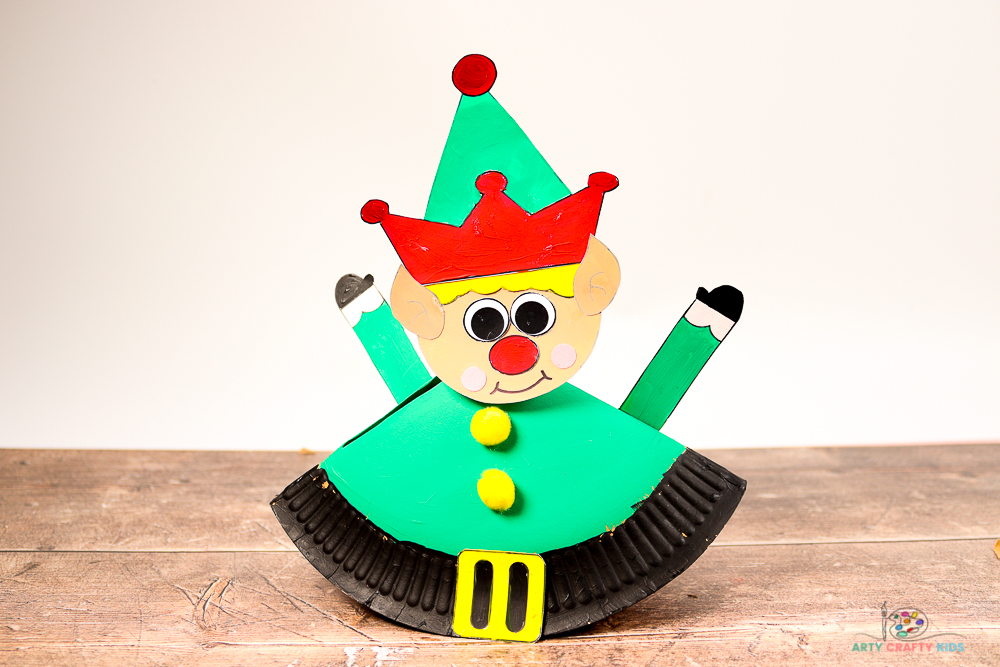 Looking for a fun and easy Christmas Craft to try with the kids? Our Rocking Paper Pate Elf craft for kids is fun and easy to make, and Kids will love how Elf's body rocks while his head jiggles!