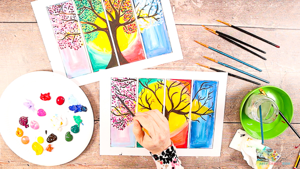 Four Seasons Tree Painting: Image showing hands painting more dots within the Spring segment, building on colors.