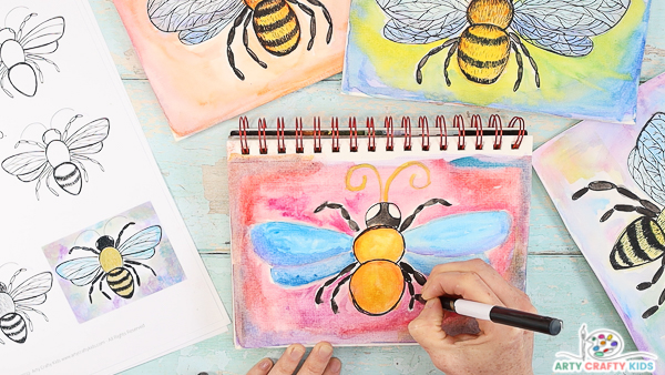 Image showing hands drawing around the bee's legs