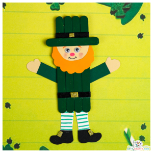 Looking for a fun and easy Leprechaun Craft for St. Patrick’s Day? hot of the heels of our adorable paper plate leprechaun, today I have the pleasure of sharing a super cute popsicle leprechaun craft that kids will love!  This crafty leprechaun project focusses on cutting, drawing and painting; all exercises that are hugely beneficial to developing fine motor skills. Arty Crafty Kids may use the tutorial to draw their own elements to complete the leprechaun craft OR utilize our printable template, to make creating easier.