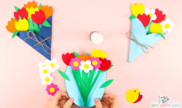 Image showing hands holding an holding paper flower bouquet.