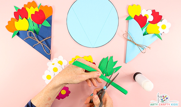 Image showing hands cutting the stems down to a shorter length.