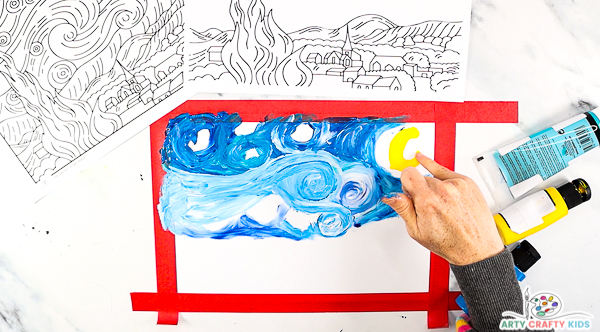 Image showing a hand finger-painting a yellow crescent moon.