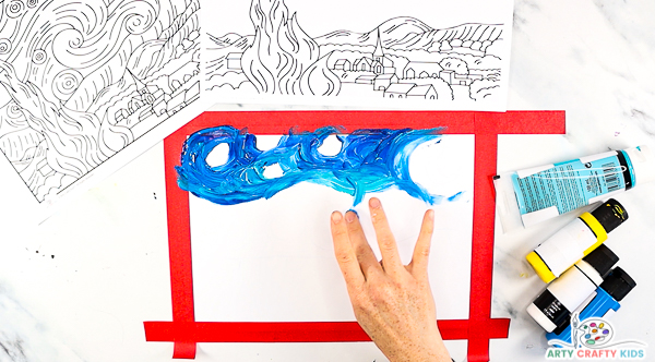 Image showing hands spreading the blue paint and blending with finger-tips.