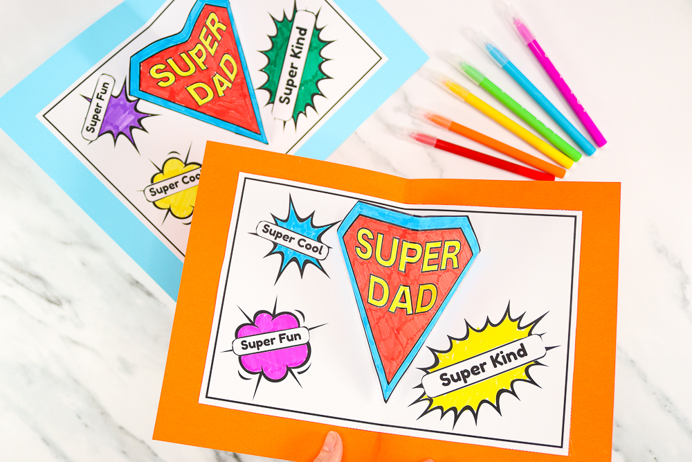 Our Super Dad Father's Day card is a SUPER easy color, cut and stick craft for kids to make. The simple pop-up element requires just a few folds and is a great way for kids' to introduce 3D effects into their crafting.