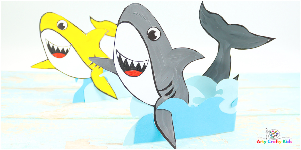 This 3D Standing Paper Shark craft is perfect for all you shark lovers out there! 

Kids will love making this paper shark craft! It's a fun and easy ocean-themed project that's perfect for summertime or any time of year and is complete with the educational benefits of exploring perspective and scale.