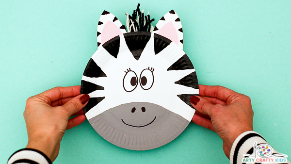 This easy paper plate zebra craft is perfect for preschoolers to make and is a fantastic craft to feature in zoo animal topic and preschoolers learning of the letter 'Z'.