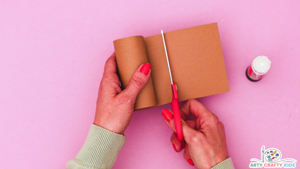 Step 4: Wrap the Paper Roll in Brown Paper.