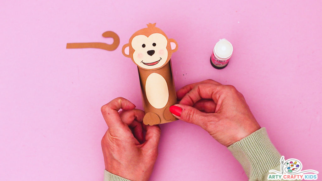 Step 7: Affix the Monkey's Feet to the Paper Roll