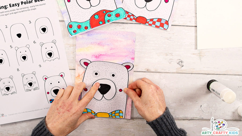 Step 13: Glue the Polar Bear Drawing to the Wintery background