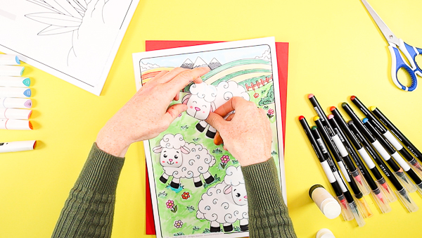 Affix the lambs head to complete their bodies and the 3D Spring coloring page.